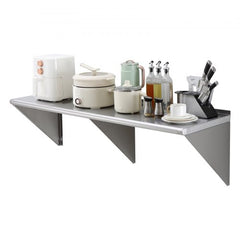 Stainless steel wall shelf measuring 18"x60" with a 450 lbs capacity and triangle support brackets.