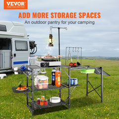 Folding camping kitchen table with aluminum top, side tables, shelves, and detachable sink.
