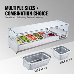 Countertop refrigerated condiment prep station with stainless steel pans and glass guard.