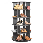 Black 5-tier rotating shoe rack tower holding various shoes and handbags on each shelf.