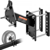 Black steel Bostome trailer spare tire carrier mount with bolts and universal bolt pattern fit.