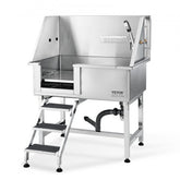 Stainless steel dog grooming tub with ramp, faucet, and anti-slip surfaces for safe bathing.