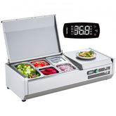 Bostome countertop refrigerated condiment prep station with stainless steel and modular pans.