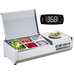 Bostome countertop refrigerated condiment prep station with stainless steel and modular pans.