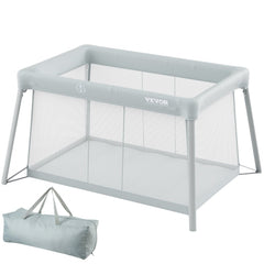 Gray folding Bostome baby travel crib and play yard with mesh sides, soft mattress, and carrying bag.