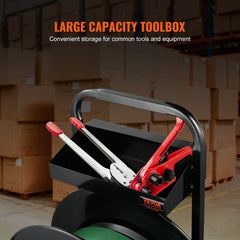 Black steel strapping dispenser cart with toolbox, holding pliers and a green roll.