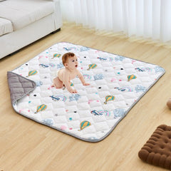 Soft, washable 50"x50" baby play mat with breathable fabric and anti-slip dots for safety.