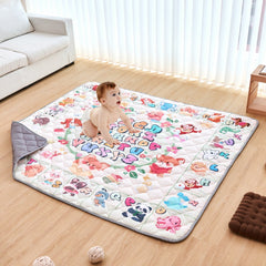 Soft, thickened baby play mat with educational patterns and anti-slip backing for safe crawling.