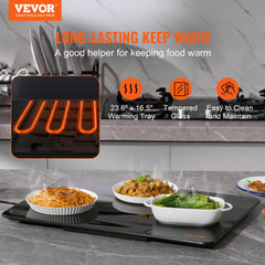 Black electric warming tray with tempered glass surface and adjustable temperature control.