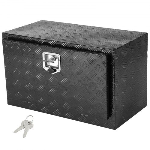 Black diamond plate aluminum truck tool box with a silver T-handle lock and two keys.