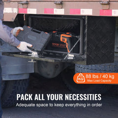 Aluminum underbody truck tool box with a lockable T-handle and rust-proof sealing.