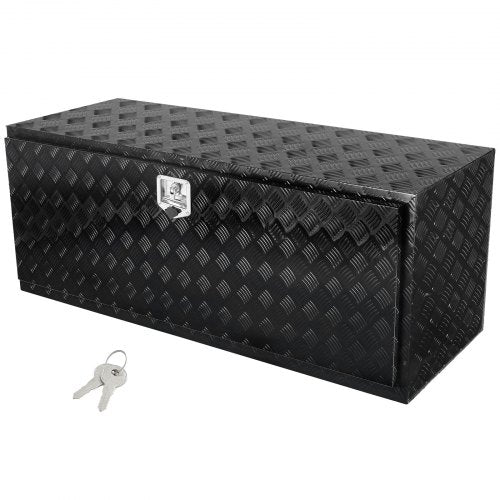 Black diamond-plate aluminum truck tool box, 60x24x24 inches, with key lock.