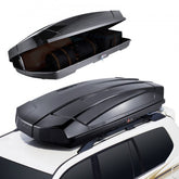 Black Bostome ABS rooftop cargo carrier with 18 cu ft capacity mounted on white SUV roof, shown open with straps inside.