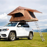 Hard shell rooftop tent for 2-3 people, waterproof with inflatable poles and adjustable ladder.