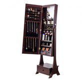 Brown standing jewelry cabinet with full-length mirror, drawers, and shelves for storage.