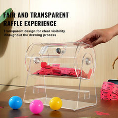 Transparent acrylic raffle drum with spinning cage holding red tickets and colorful balls.
