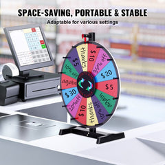 A 24-inch heavy-duty tabletop spinning prize wheel with 14 slots and a black stand next to a cash register.