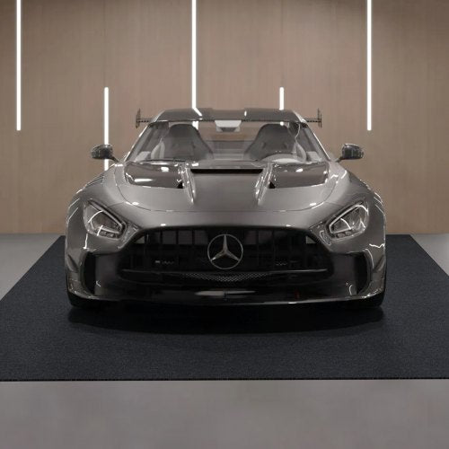 Heavy-duty gray-black garage floor mat, 7.5'x20', waterproof with non-slip surface.