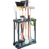 Green plastic garden tool organizer rack with 10 slots holding tools like rakes, shovels, and a watering can.