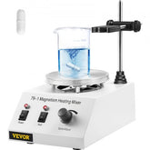 A white magnetic stirrer hot plate with a beaker of blue liquid and a stir bar.