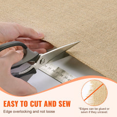 Hands cutting a roll of natural burlap fabric with scissors, showing easy edge finishing.