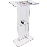 Clear acrylic podium stand with a wide reading surface and integrated storage shelf.