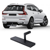 Steel 2-inch receiver hitch step with anti-slip surface for secure footing and easy installation.