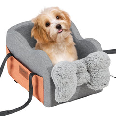 Dark gray dog car seat with plush pad, safety tether, and large storage pocket for small dogs.