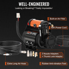 Black onboard air compressor kit with orange accents, air hose, power cord, and adapters.