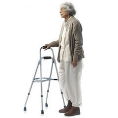 Silver-haired senior woman using a one-arm folding hemi walker with adjustable height.