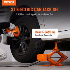 Orange 3-ton electric scissor car jack kit with impact wrench lifting a vehicle tire.