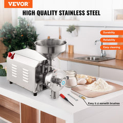 Stainless steel commercial grain grinder mill with hopper and control dial on kitchen counter.