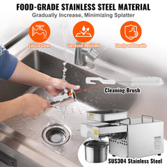 Stainless steel electric oil press machine with adjustable temperature and residue separation.