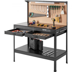 Heavy duty steel workbench with LED light, power outlets, and ample storage for tools.