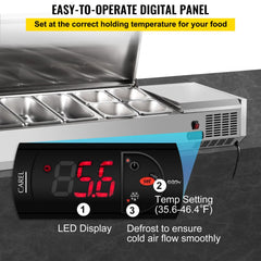 55-inch stainless steel refrigerated condiment prep station with digital LED temperature display showing 85.6°F and defrost controls.
