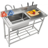 Stainless steel utility sink with single bowl, workbench, and adjustable legs for stability.