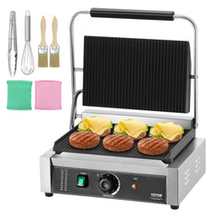 Stainless steel Bostome electric panini press grill, 14x9 inch, with hinged plates, controls, and accessories.