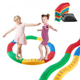 Two children balancing on colorful interlocking non-slip balance beam stepping stones.