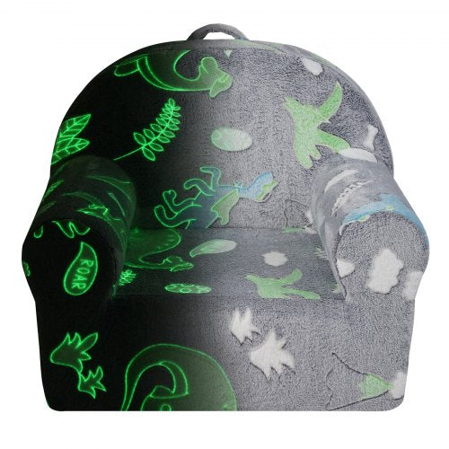 Grey toddler armchair with glow-in-the-dark dinosaur and leaf patterns, soft fabric upholstery.