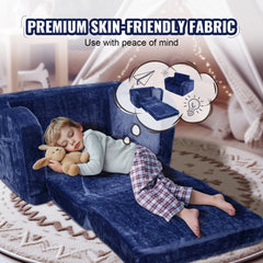 Blue foldable kids couch with a sleeping toddler, convertible to bed.