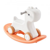 Red Bostome 3-in-1 rocking horse for toddlers, featuring a high backrest and smooth wheels.