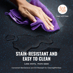 A hand holds a purple microfiber cloth over a dark surface with water droplets, highlighting stain-resistant and easy-clean features.