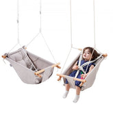 Bostome Canvas Hammock Baby Swing in beige with 5-point harness and removable cushion.