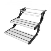 Two-step manual retractable RV steps made of aluminum alloy with non-slip treads.