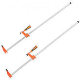 Two Bostome 36-inch F-Clamps with cast iron jaws and 600 lbs load limit for woodworking.