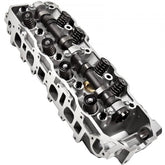 Aluminum cylinder head for 1985-1995 Toyota 22R 22RE 2.4L SOHC engine with camshaft and valves visible