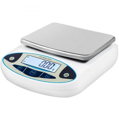 A white and blue electronic scale with a stainless steel weighing pan displays "0.00 g".