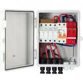 Open white IP65 PV combiner box with 4 strings, 15A fuses, 63A breaker, and wiring.