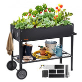 Black galvanized metal raised garden bed with sturdy legs and wheels for mobility.