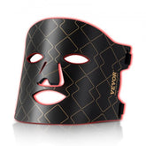 Black silicone LED face mask with red light glow and diamond pattern.